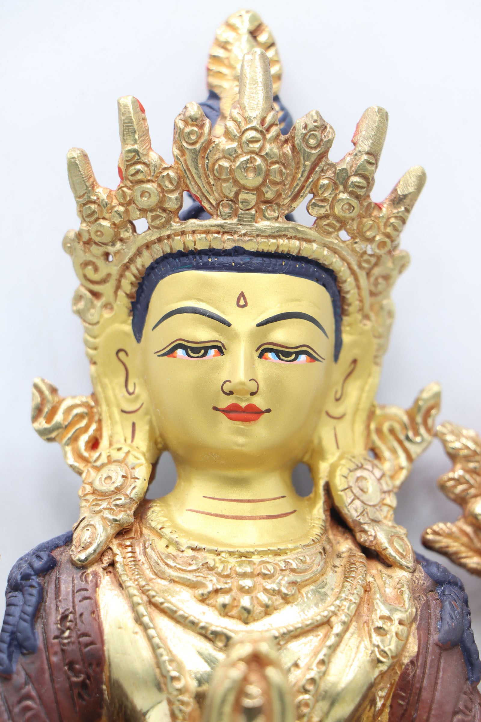 Chengresi Statue serves as a focal point for meditation, devotion, and prayers.