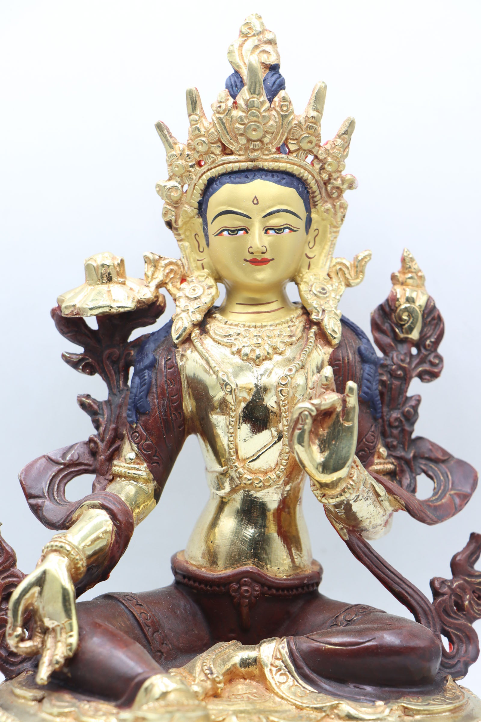 Green Tara Statue is associated with qualities such as compassion, healing, protection, and the swift removal of obstacles.