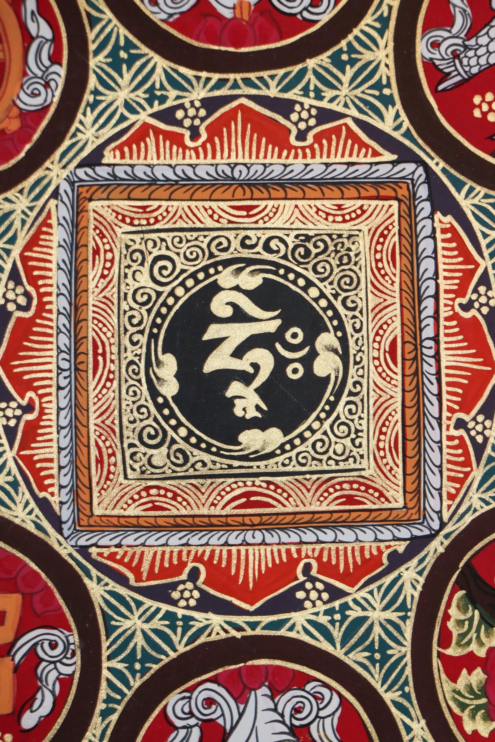 Handpainted black and gold Thangka painting.