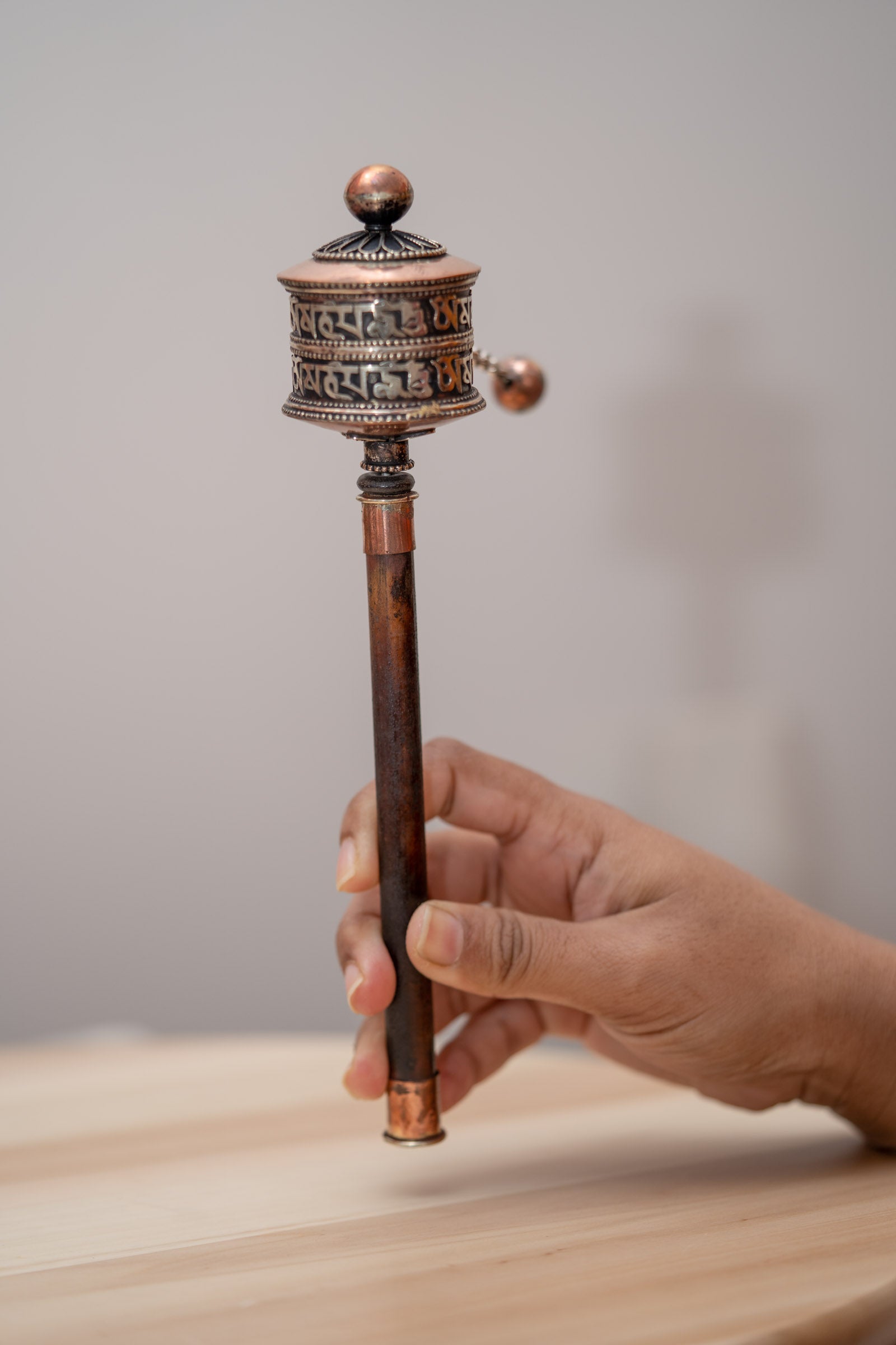 Wood Handle Prayer Wheel for spirituality and religious purpose.