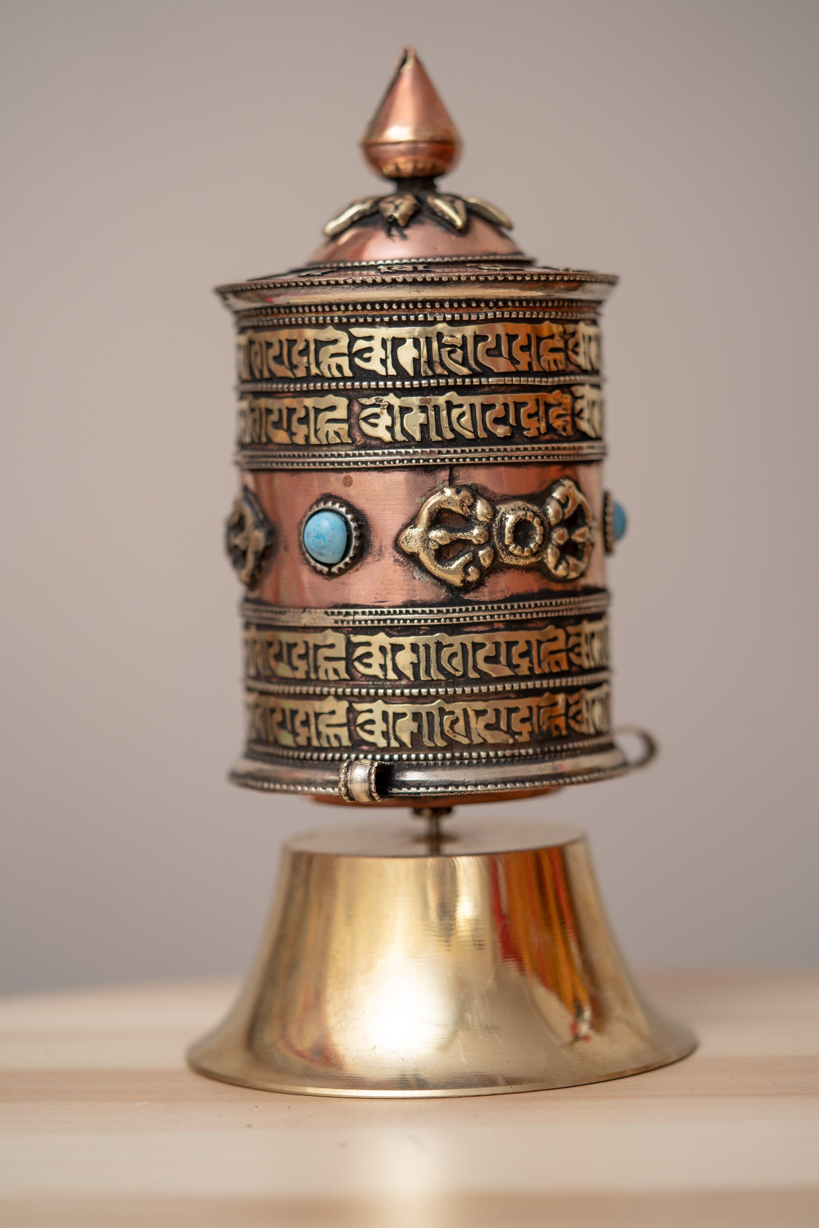 Spinning the Bajra prayer wheel purifies negative karma, obscurations, and defilements.