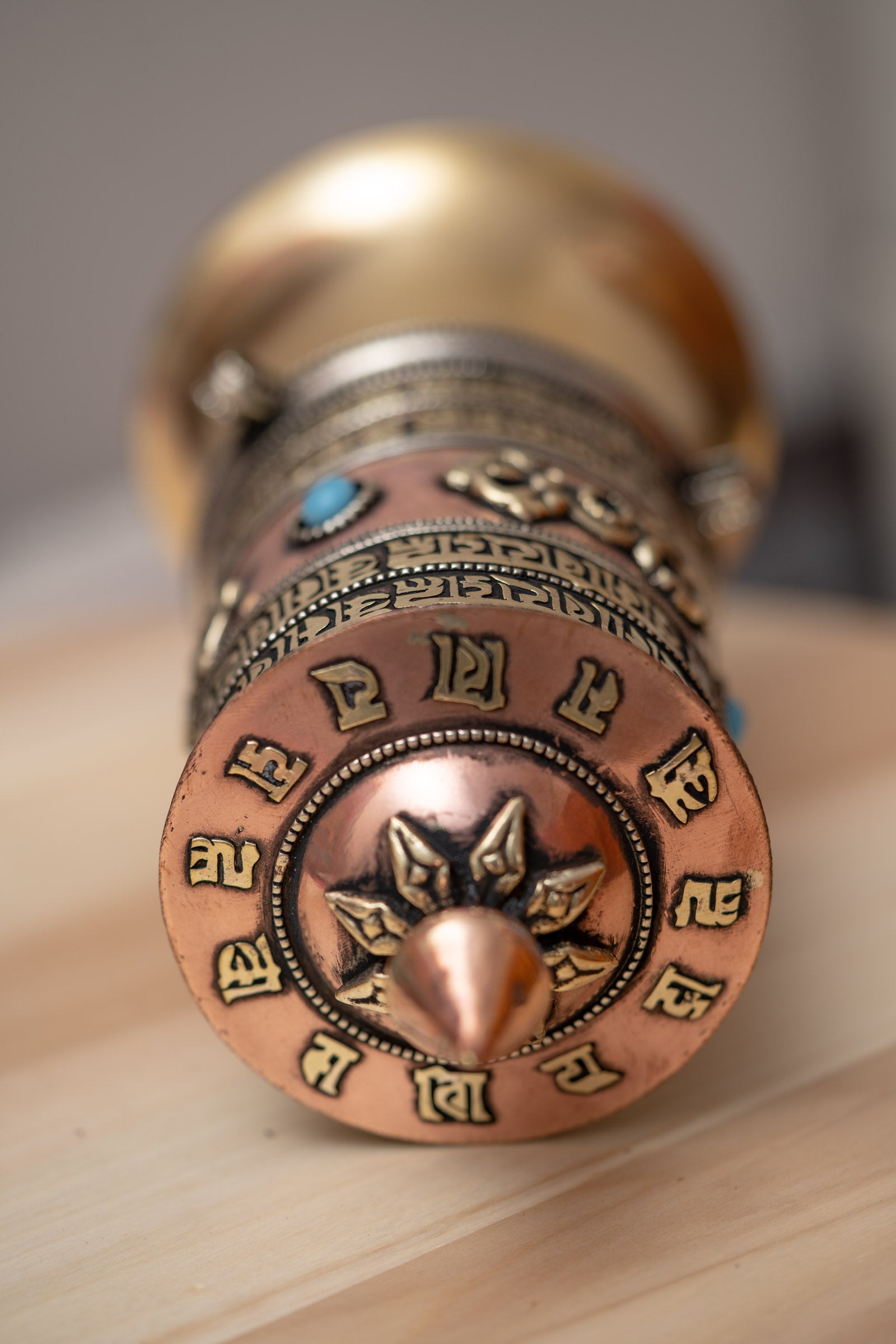 Spinning the Bajra prayer wheel purifies negative karma, obscurations, and defilements.