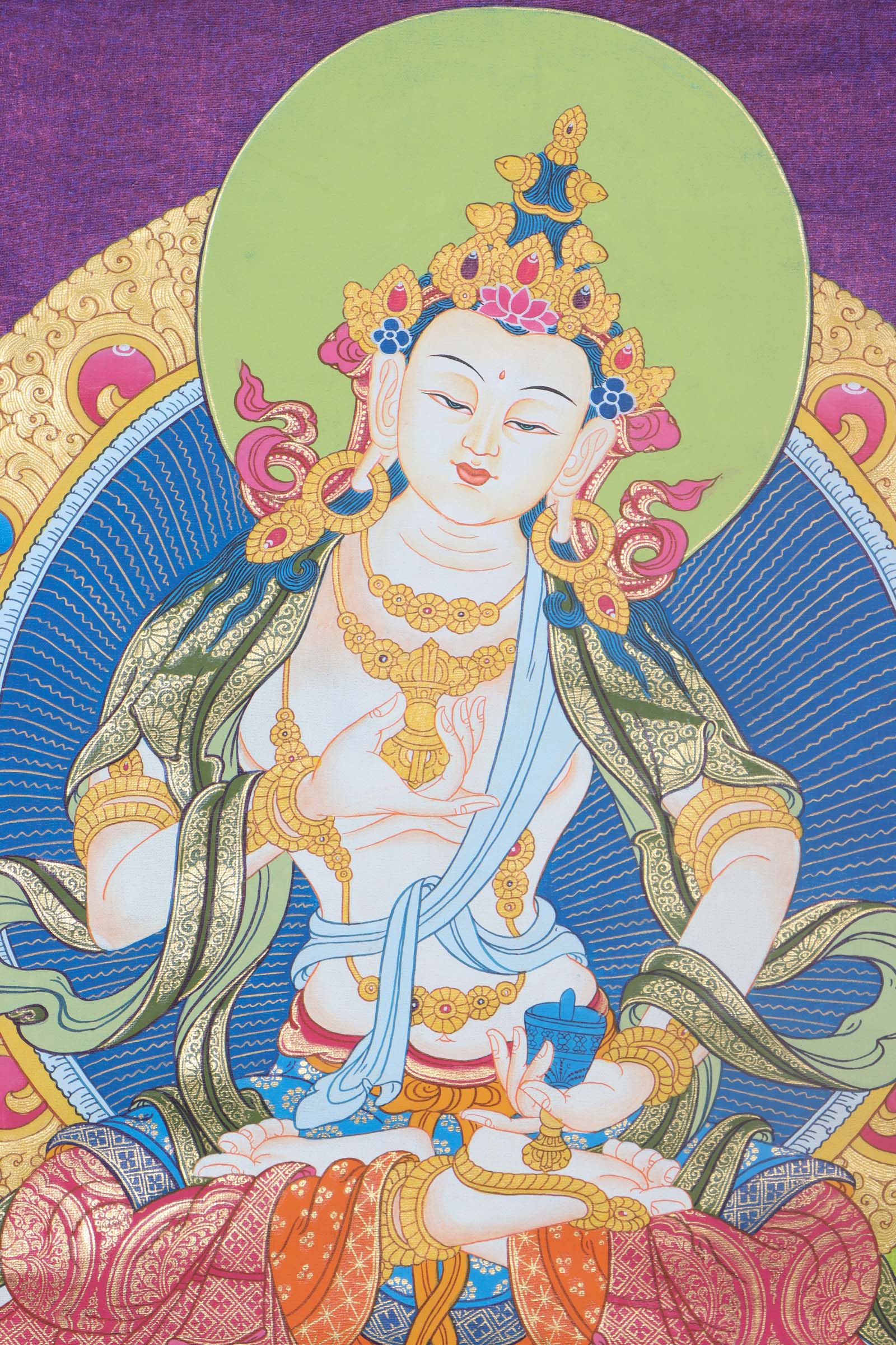 Vajrasattva Thangka - a colorful painting featuring a peaceful deity with white skin and a gentle expression. Holding a vajra and a bell, he sits on a lotus flower, surrounded by intricate patterns and symbols. A powerful representation of purity and enlightenment in Tibetan Buddhism.