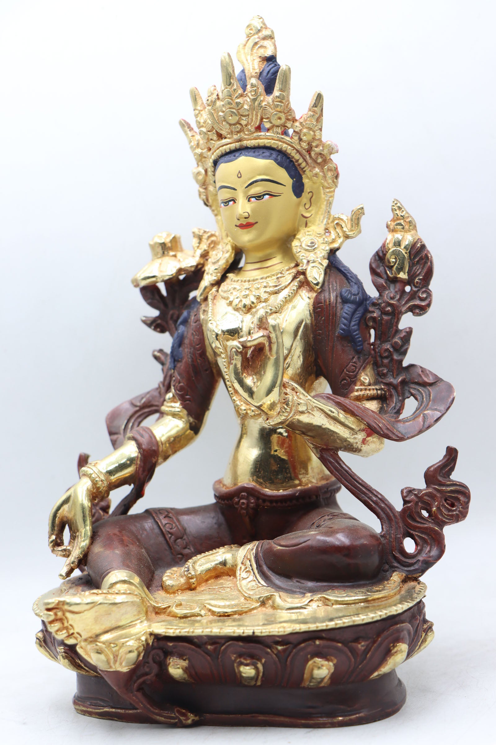 Green Tara Statue is associated with qualities such as compassion, healing, protection, and the swift removal of obstacles.