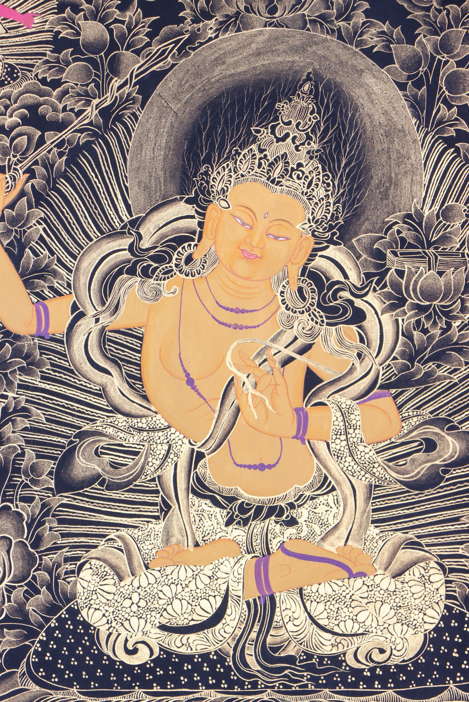 Manjushri Thangka Painting serves as visual aid for meditation.