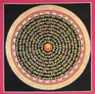 Mantra Mandala  Thangka with om symbol  scripted in its  center.
