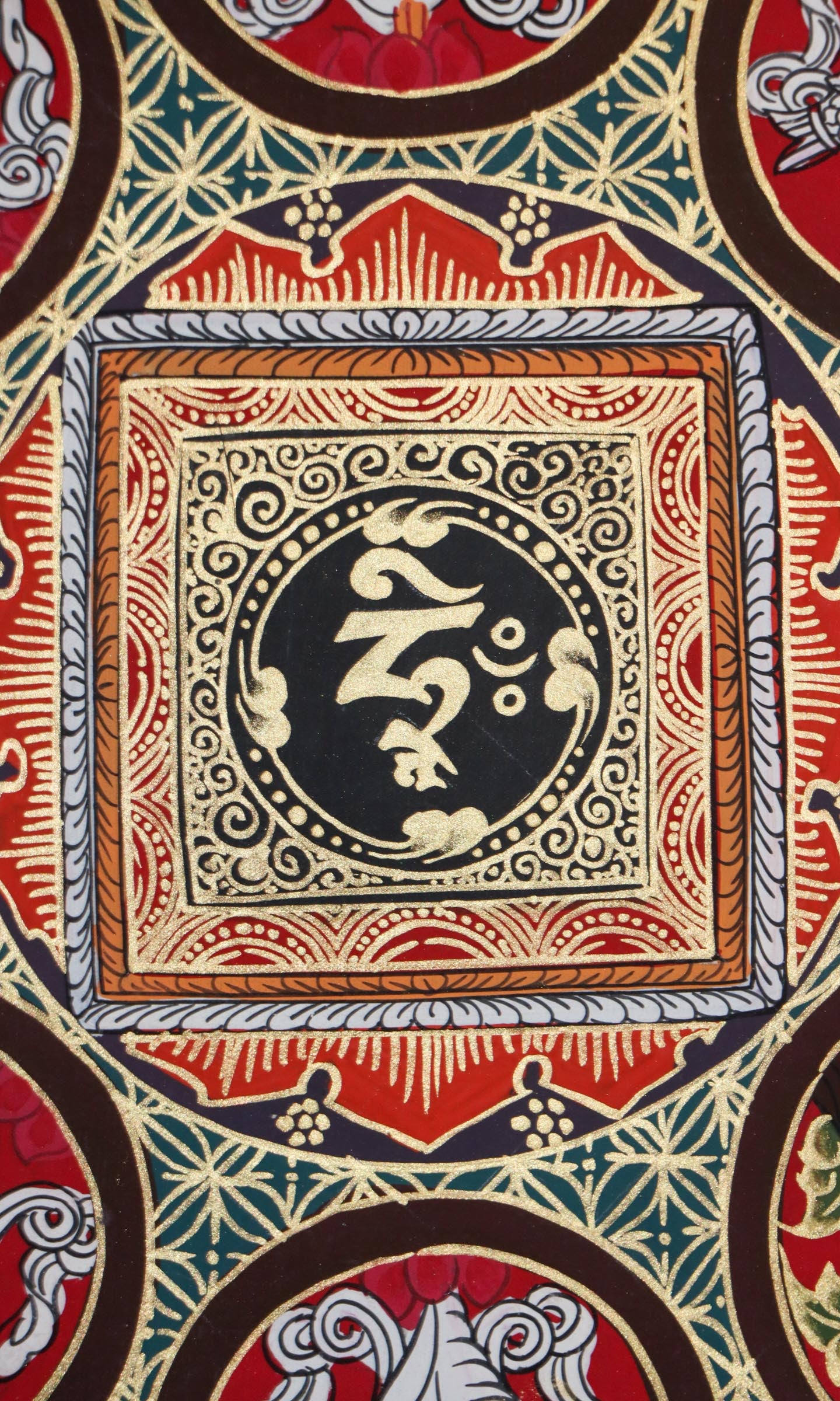 Handpainted black and gold Thangka painting.