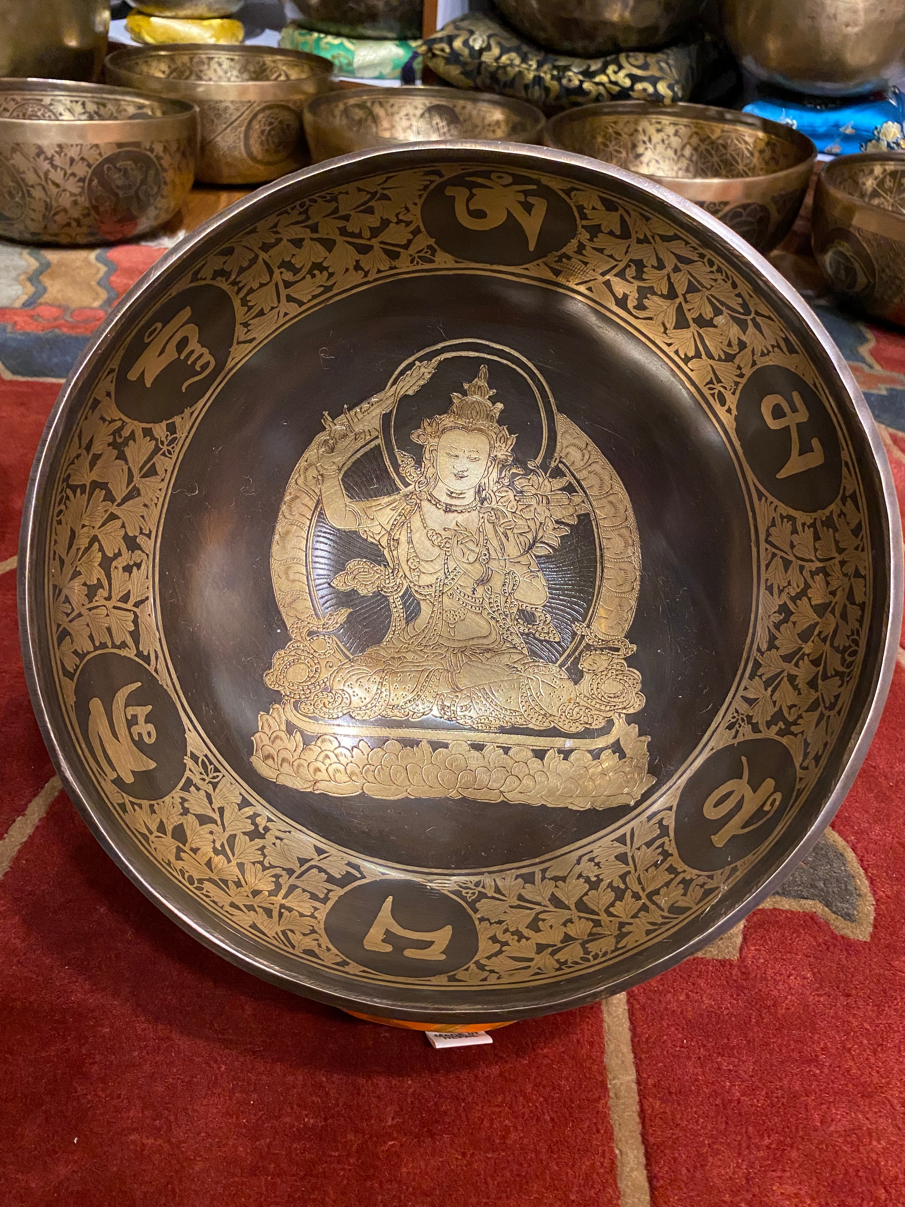 Handcrafted Tibetan Manjushree Carved Singing Bowl for meditation.