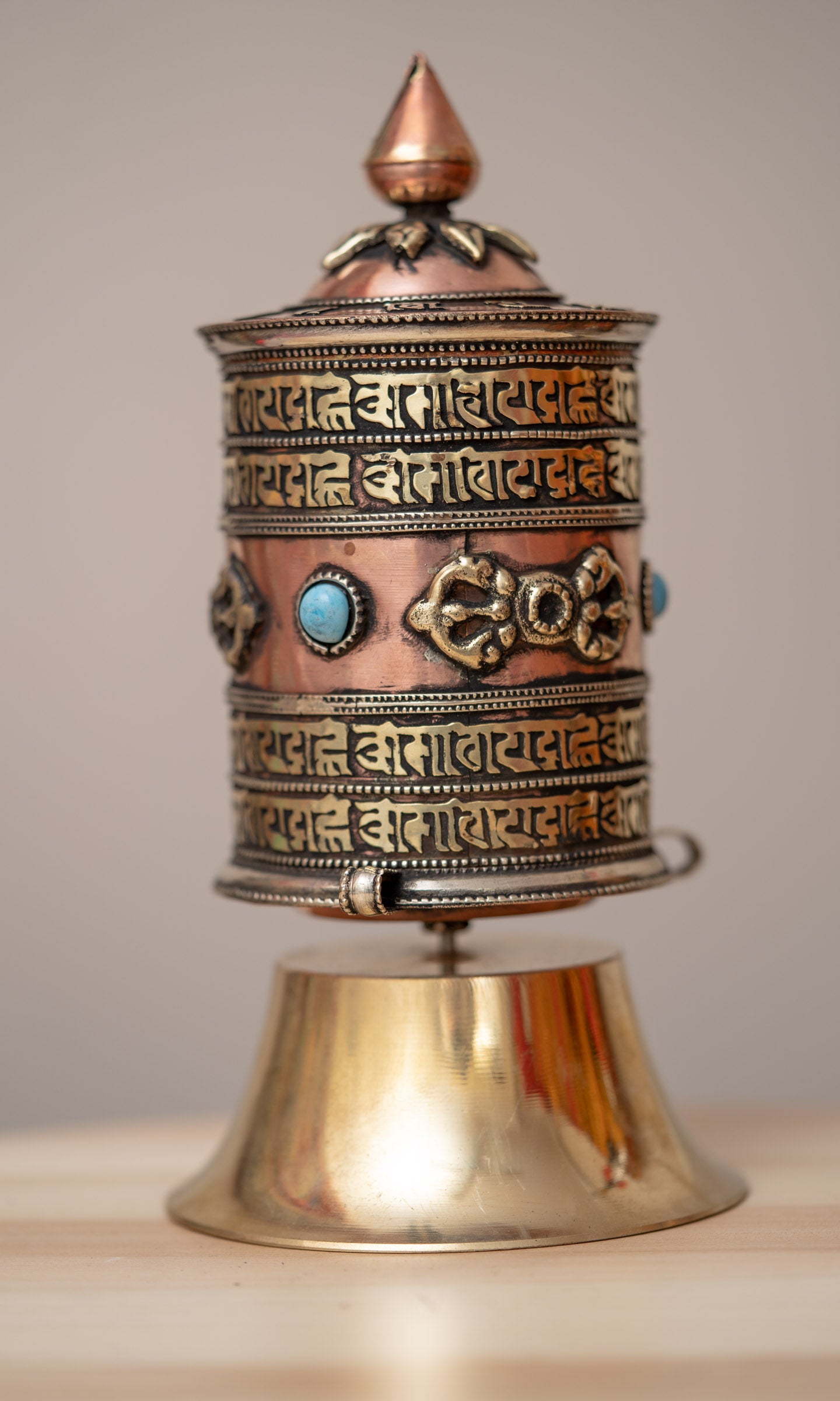 Spinning the  Bajra prayer wheel purifies negative karma, obscurations, and defilements.