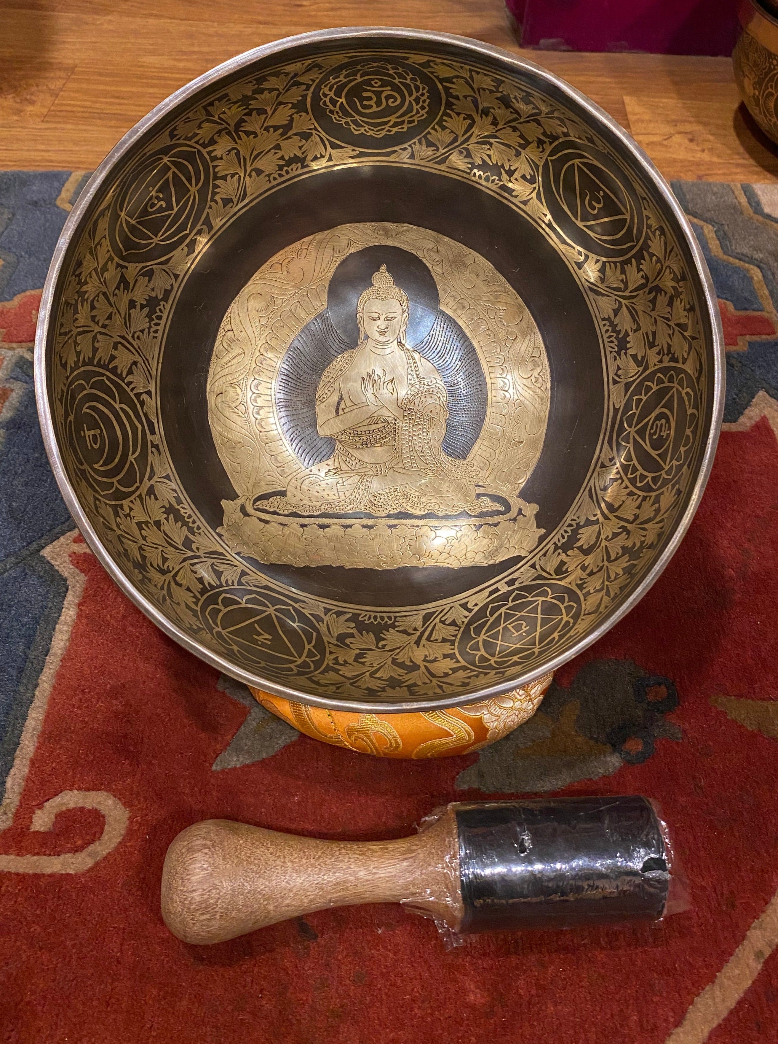 Vairochana Buddha Carved Singing Bowl - Tibetan Bowl for meditation.