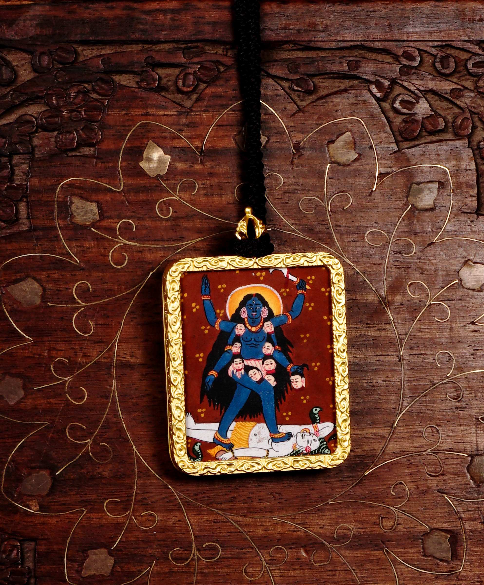 Mahakali Ghau Thangka locket with hand-painted fierce goddess artwork inside traditional Himalayan amulet Nepal