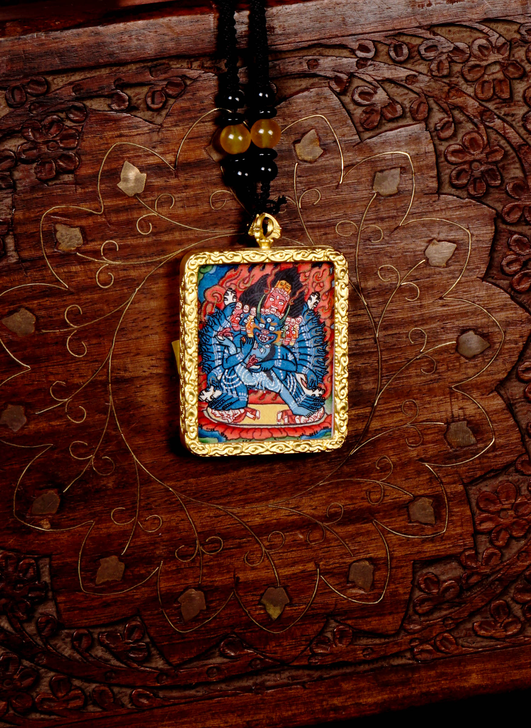 Yamantaka Ghau Thangka locket with hand-painted wrathful deity artwork inside traditional Himalayan amulet Nepal