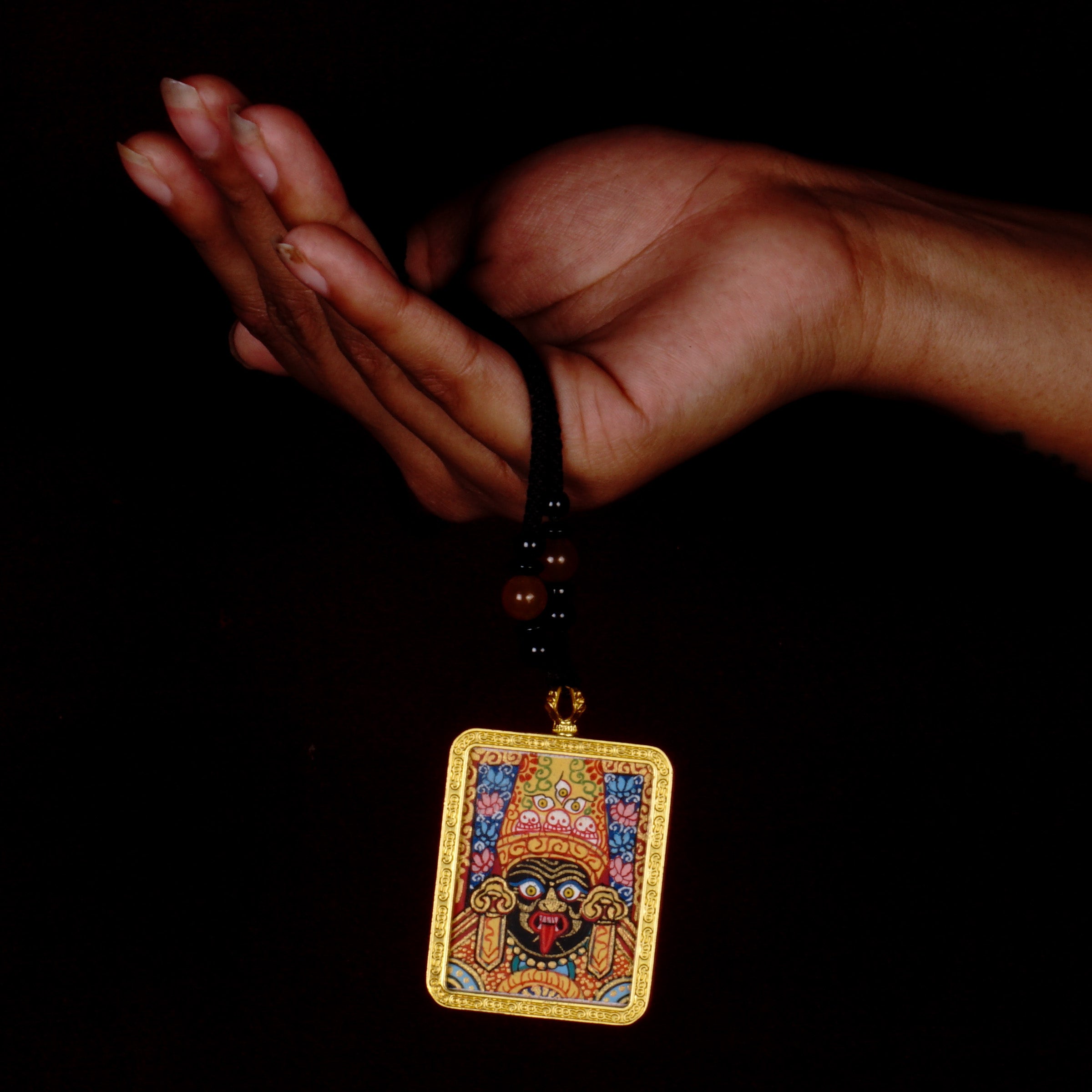 Zachyi Lhamo Ghau Thangka locket with hand-painted fierce deity artwork inside traditional Himalayan amulet Nepal
