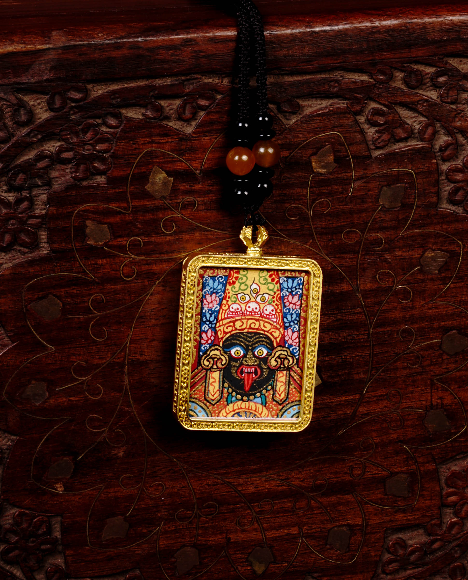 Zachyi Lhamo Ghau Thangka locket with hand-painted fierce deity artwork inside traditional Himalayan amulet Nepal