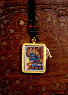 Mahakala Ghau Thangka locket with hand-painted wrathful deity artwork inside traditional Himalayan amulet Nepal
