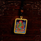 Green Tara Ghau Thangka locket with hand-painted goddess artwork inside traditional Himalayan amulet Nepal