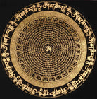 Om Mandala Thangka with Tibetan Aum symbol and sacred mantra design on black background.