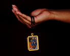 Mahakala Ghau Thangka locket with hand-painted wrathful protector deity artwork inside traditional Himalayan amulet Nepal