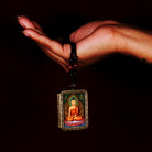 Shakyamuni Buddha Miniature Thangka locket with hand-painted Buddha artwork inside traditional Himalayan amulet Nepal