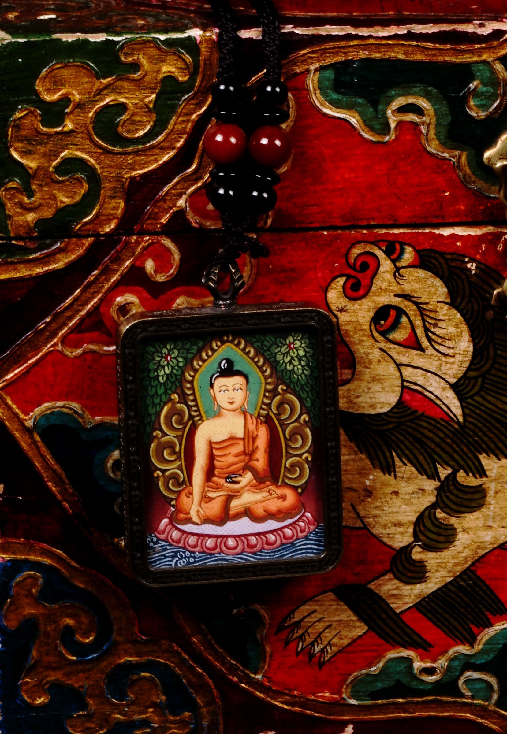 Shakyamuni Buddha Miniature Thangka locket with hand-painted Buddha artwork inside traditional Himalayan amulet Nepal