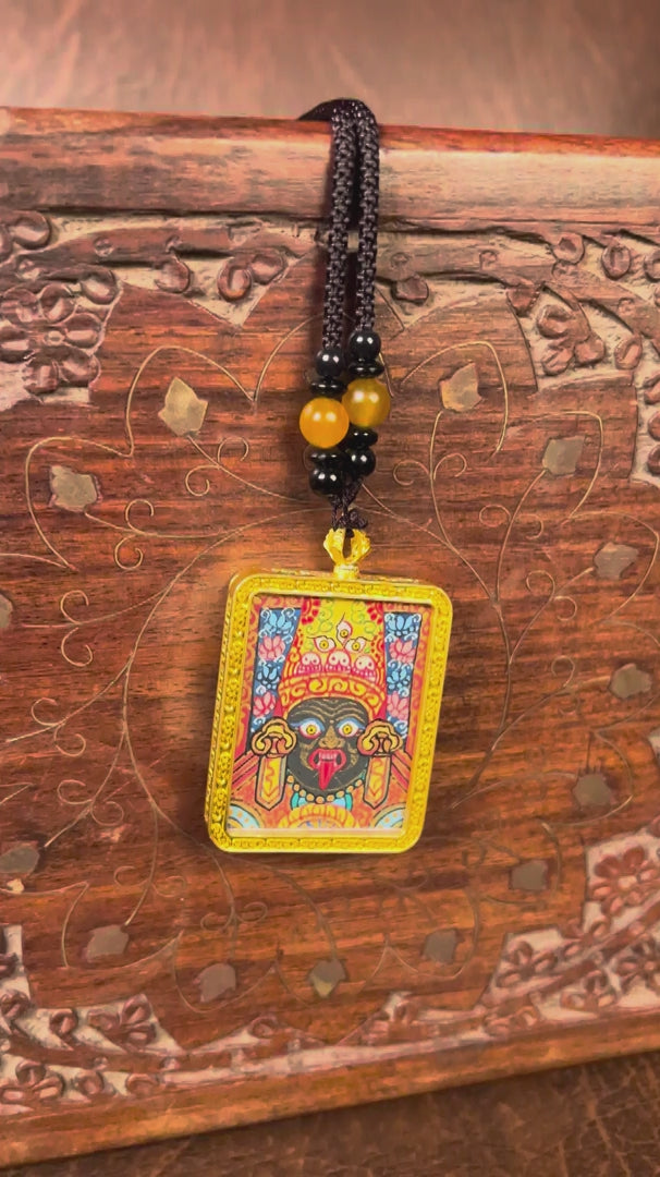 Zachyi Lhamo Ghau Thangka locket with hand-painted fierce deity artwork inside traditional Himalayan amulet Nepal