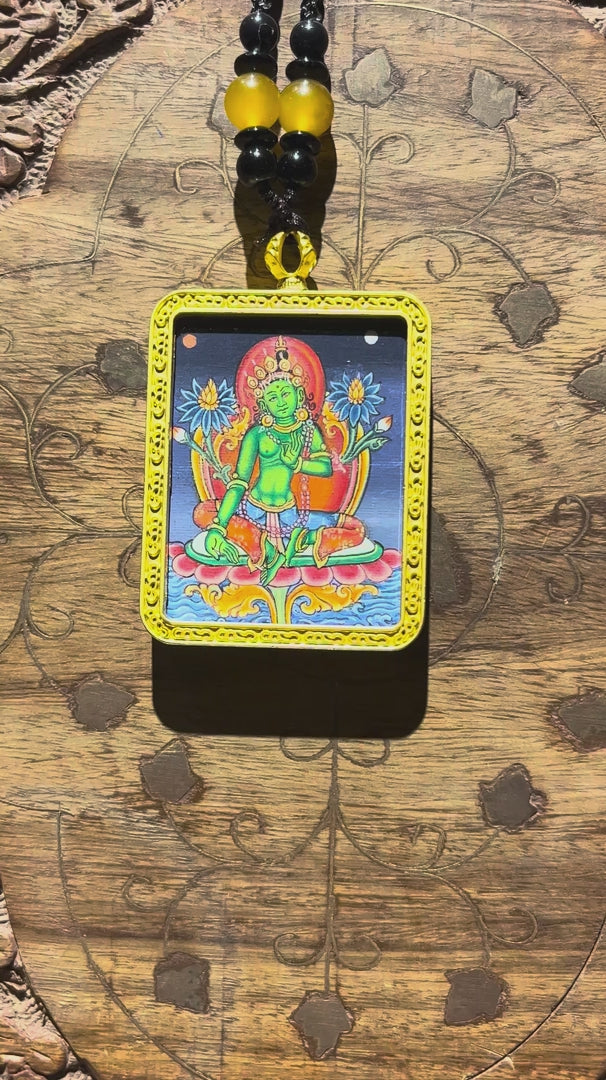 Green Tara Ghau Thangka locket with hand-painted goddess artwork inside traditional Himalayan amulet Nepal