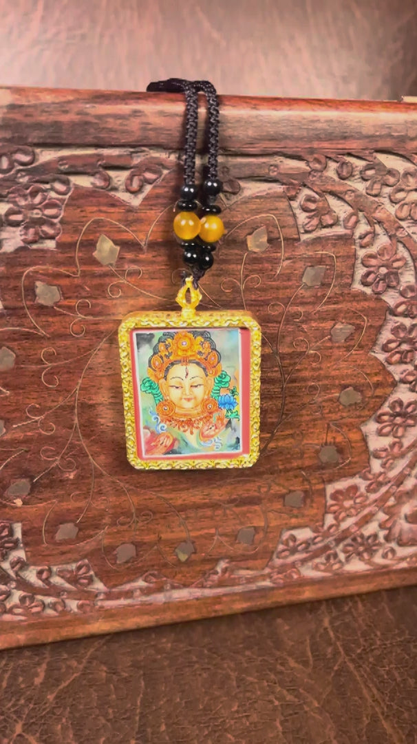 White Tara ghau locket thangka peace, balance, and spiritual nourishment.