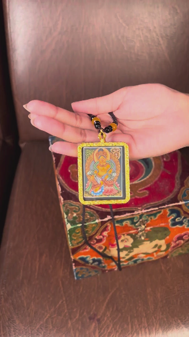 Orange Lotus Zambala Thangka Locket Provides reassurance and emotional stability