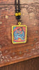 Yamantaka Ghau Thangka locket with hand-painted wrathful deity artwork inside traditional Himalayan amulet Nepal