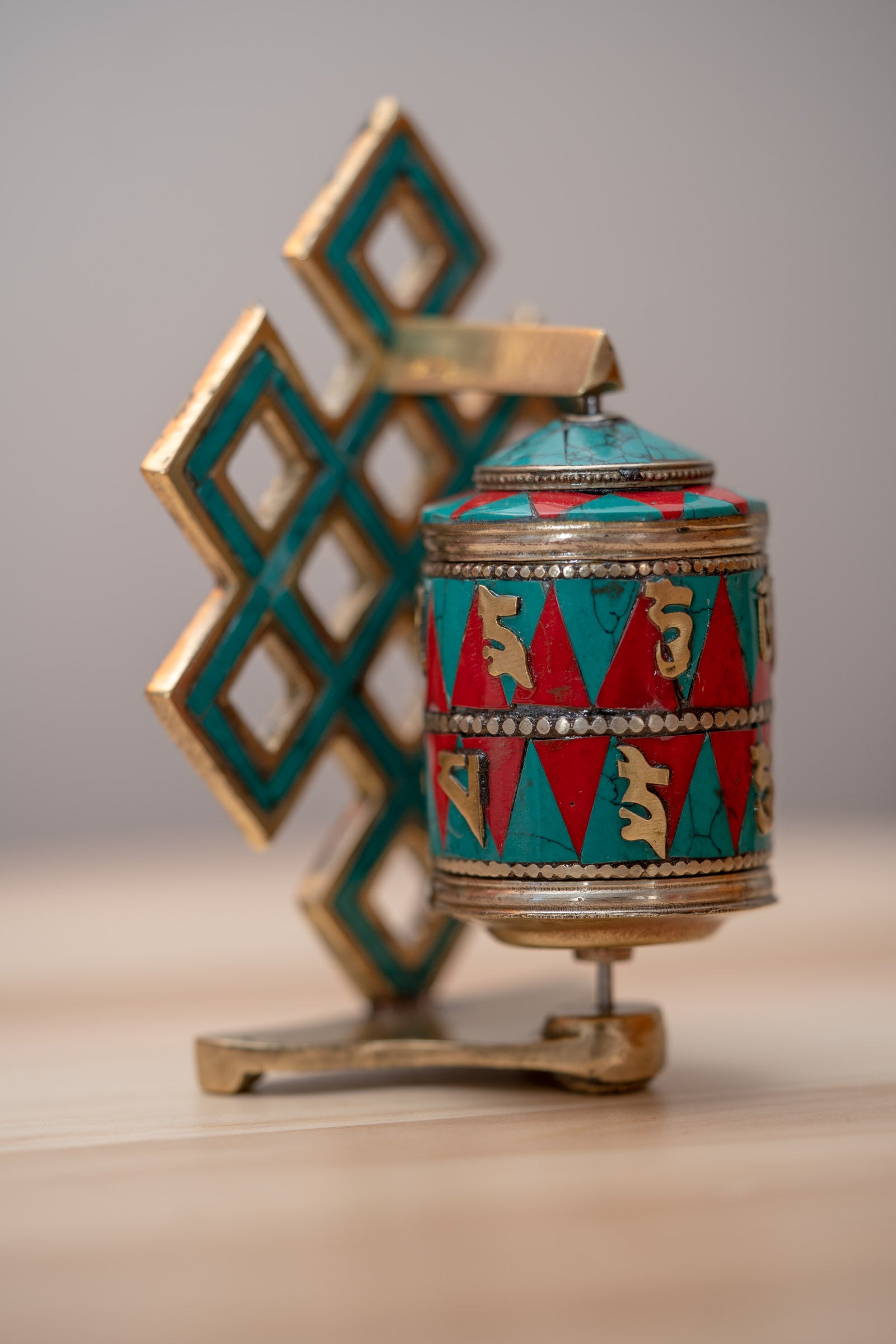 Endless Knot Prayer Wheel serves as a means to cultivate mindfulness and focus.