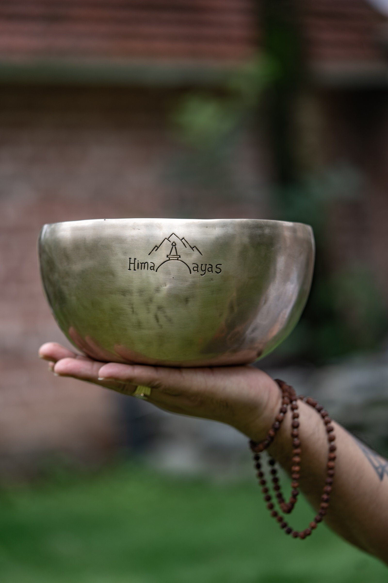 Tibetan Singing Bowl with Green Tara Carving - Lucky Thanka